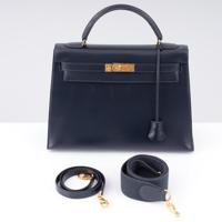 Hermes KELLY 32 Navy Box Leather Handbag - Sold for $10,240 on 05-17-2026 (Lot 610).jpg